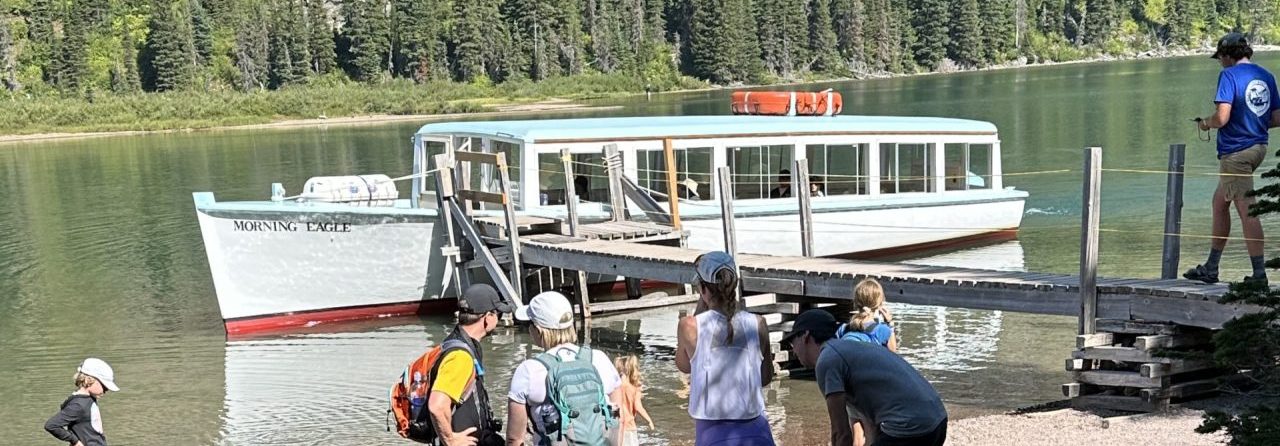 The Morning Eagle historic boat getting ready to board Grinnell Glacier hikers for the return trip in Glacier National Park